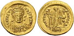 BYZANTINE COINS BYZANTINE EMPIRE. JUSTINUS I, 518-527. Solidus ca. AD 522-527, Constantinople. AV. 4,50 g. D N IVSTINVS P P AVG Helmeted and cuirassed bust facing slightly right, holding spear and shi