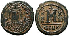 Imperio Bizantino MAURICIO TIBERIO. Follis. (Ae. 10,43g/28mm). 582-602 d.C. Theoupolis . (Seaby 533). Anv: Busto de Mauricio Tiberio de frente con coraza y corona, alrededor leyenda: DN MAVRI C N P AV