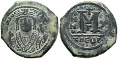 Imperio Bizantino MAURICIO TIBERIO. Follis. (Ae. 11,70g/31mm). Año X (591-592 d.C.). Theoupolis (Antioquía). (Seaby 533). Anv: Busto de Mauricio Tiberio de frente con coraza y corona, alrededor leyend