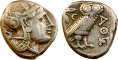 Attique, tétradrachme de style intermédiaire, Athènes, c.393-355 av. J.-C. A/Anépigraphe. Tête d'Athéna à droite, coiffée du casque à aigrette, orné sur le devant de trois feuilles d'olivier ; elle po