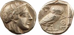 Attique, tétradrachme, Athènes, c.480-400 av. J.-C. A/Anépigraphe. Tête d'Athéna à droite, coiffée du casque à aigrette, orné sur le devant de trois feuilles d'olivier ; elle porte des boucles d'oreil