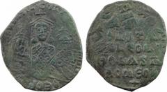 Basile Ier, Constantin et Léon, follis surfrappé, Constantinople, 870-877 A/+ LEON bASIL S CONST AVGG Basile, Léon à gauche et Constantin à droite, de face, revêtus de la chlamyde et portant le stemma