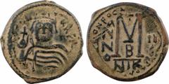 Byzantine coins Héraclius, follis refrappé sur un follis de Phocas, c.611-612, seconde officine, Nicomédie A/[D N ERACLI - VS PP AV] Buste de face d'Héraclius portant le stemma vêtu de la chlamyde et 