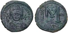 Byzantine Coins Justinian I. Æ Follis (23.19 g), 527-565. Theoupolis, RY 13 (539/40). D N IVSTINIANVS PP AVI, helmeted and cuirassed bust of Justinian I facing, holding globus cruciger and shield; in 