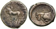 Sicily, Gela, c. 420-415 BC. AR Tetradrachm (16.44 g). Slow quadriga driven left by charioteer; above, Nike crowning horses. Reverse: Forepart left of man-headed bull. Jenkins 470; BMC 49 (same dies);