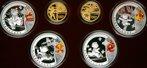 China. Gold and Silver Set for the Beijing Olympic Games, 2008. Gold 150 Yuan (2 pieces). 1/3 Ounce each .999 fine gold. Silver 10 Yuan (4 pieces) 1 ounce each. Gold features an ancient Chinese archer