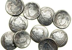 Celtic Coinage, Danube Region. Imitating Philip II of Macedon. Ca. 2nd Century BC. Silver Tetradrachms. Imitating Philip II of Macedon. Chinless Type, Diademed head of Zeus right, chinless. Reverse: R