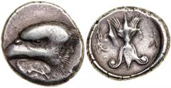Elis, Olympia. 95th Olympiad. Silver Stater (12.10g), ca. 400 BC. Long considered the most powerful animal effigy on Greek coinage. Unsigned, but by the artist Da. Eagle's head left; below, large whit