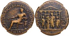 Caligula, AD 37-4. Bronze Sestertius (29.97g). Pietas, veiled and draped, seated left holding patera, l. arm resting on small facing figure. Reverse: Temple of Divus Augustus with Gaius veiled and tog