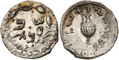 Judea, Bar Kochba Revolt. Silver Zuz (3.3 g), 132-135 CE. Undated, attributed to year 3 (134/5 CE). 'Sim'on' in two lines within wreath of thin branches wreapped around eight almonds. Reverse: 'For th