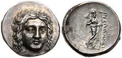 Carian Satraps. Pixodaros. Silver Didrachm (6.62 g), ca. 341/0-336/5 BC. Halikarnassos. Laureate head of Apollo facing slightly right. Reverse: ΠIΞΩΔAPOY, Zeus Labraundos standing right, holding labry