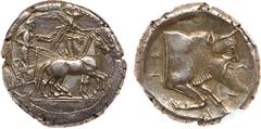 Sicily, Gela. Silver Tetradrachm (17.26 g), ca. 480/75-475/0 BC. Charioteer driving slow quadriga right; above, Nike flying right, crowning horses with wreath. Reverse: CEΛAΣ, forepart of man-headed b