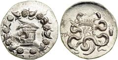 Lydia, Tralleis, c. 128-85 BC. AR Cistophoric Tetradrachm (12.71 g). Serpent emerging from Cista Mystica, within border of ivy leaves and fruit. Reverse: Two intertwined serpents flanking ornate bow c