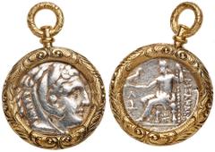 A 14K Yellow Gold and Ancient Greek "Alexander III the Great" Silver Tetradrachm, Ca. 336-323 BC with Head of Heracles. Lovely pendant of an ancient Greek Silver Tetradrachm in a 14K yellow gold bezel