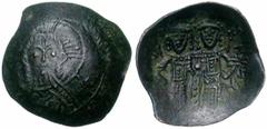 Lot de 4 bronzes: Justin II (565-578), follis, Antioche, an 7, officine Γ; Jean II Comnène (1118-1143), aspron trachy, Constantinople; Manuel Ier Comnène (1143-1180), aspron trachy, Constantinople; Al