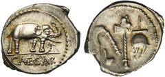 ROMAN REPUBLIC Jules César (†44), AR denier, 49-48 av. J.-C., Gaule. D/ CAESAR Eléphant à d. piétinant un dragon. R/ Emblèmes sacerdotaux: culullus, aspergillum, hache et apex. Cr. 443/1; Syd. 1006. 3