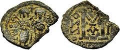 ORIENTAL WORLD : Arab-Byzantine - Turkey ARAB-BYZANTINE, AE follis, year 7 (frozen; c. 675-700), Baysan (Skythopolis). Mint name in Greek only. Obv./ Twin figures, type of Justin and Sophia. Rev./ Cap