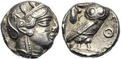 GREEK WORLD ATTIQUE, ATHENES, AR tétradrachme, 390-300 av. J.-C. D/ T. casquée d''Athéna à d., le casque orné d''un fleuron et de feuilles d''olivier. R/ AΘE Chouette à d., t. de f. A g., pousse d''ol