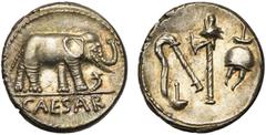 ROMAN REPUBLIC Jules César (†44), AR denier, 49-48 av. J.-C., Gaule. D/ CAESAR Eléphant à d. piétinant un dragon. R/ Emblèmes sacerdotaux: culullus, aspergillum, hache et apex. Cr. 443/1; Syd. 1006. 3