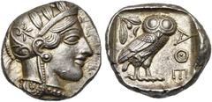 CONTINENTAL GREECE ATTIQUE, ATHENES, AR tétradrachme, vers 410 av. J.-C. D/ T. d''Athéna casquée à d., le casque orné d''un fleuron et de trois feuilles d''olivier. R/ Chouette à d., t. de f. A g., po