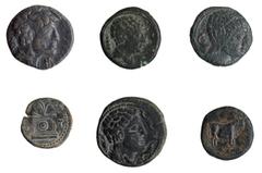 6 monedas: Kese (3), 2 ases y 1 semis; Tarraco (2), semis; Iltirta, 1 as. BC/MBC.
