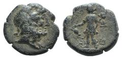 Lydia, Nysa, c. 1st century BC. Æ (15mm, 3.62g, 12h). Jugate heads of Hades and Demeter r. R/ Dionysos standing l., holding kantharos and thyrsus. Regling Nysa 15a. Green patina, VF