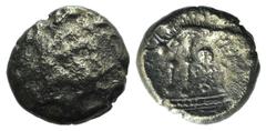 Celtic, Britain. Iceni, c. 65-1 BC. Base AV Stater (16mm, 4.18g, 12h). Norfolk Wolf type. Devolved head of Apollo r. R/ Wolf standing l.; pellets and crescent above, large pellet and three small pelle
