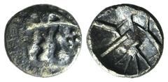 Celtic, Britain, Durotriges, c. 65 BC-AD 45. AR Quarter Stater (11mm, 1.04g, 6h), c. 58-45 BC. Half crescent with three appendages hanging below; daisy to r. R/ Vertical zig-zag pattern; uncertain obj