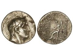 Tetradracma. 162-150 a.C. DEMETRIO I. REINO SELÉUCIDA. Anv.: Cabeza diademada a derecha. Rev.: Tyche sentada a izquierda delante y detrás leyenda. 16,70 grs. AR. (Leves oxidaciones). Se-7015. MBC/MBC-