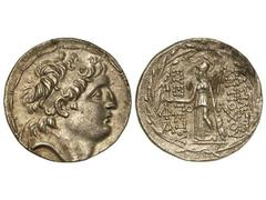 Tetradracma. 138-129 a.C. ANTÍOCO VII. REINO SELÉUCIDA. Anv.: Cabeza diademada a derecha. Rev.: Atenea en pie a izquierda, sosteniendo a Nike, delante y detrás leyenda, todo dentro de corona de laurel