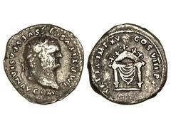 Denario. Acuñada el 79-80 d.C. TITO. Anv.: IMP. TITVS CAES. VESPASIAN. AVG. P. M. Cabeza laureada a derecha. Rev.: TR. P. IX IMP. XV COS. VIII P. P. Trono. (Rayita en anverso). C-313. MBC.