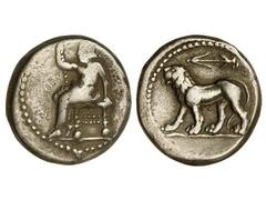 Tetradracma. 311-280 a.C. BABILONIA. Anv.: Baal entronizado a izquierda. Rev.: León a izquierda, encima símbolo. 15,70 grs. AR. Se-6148. MBC-/MBC.