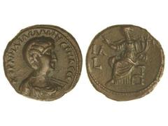 Tetradracma. 266 d.C. SALONINA. ALEJANDRÍA. Rev.: Concordia sentada a izquierda, alzando la diestra y sujetando doble cornucopia. A izquierda letras I A L. AE. GIC-No cat. MBC+.