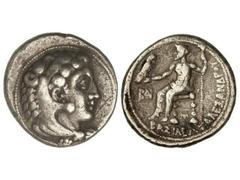 Tetradracma. 336-323 a.C. ALEJANDRO MAGNO. Anv.: Cabeza de Hércules con piel de león a derecha. Rev.: Zeus entronizado a izquierda, delante anagrama, leyenda semicircular a izquierda. 17,10 grs. AR. S