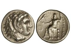 Tetradracma. 336-323 a.C. ALEJANDRO MAGNO. Anv.: Cabeza de Hércules con piel de león a derecha. Rev.: Zeus entronizado a izquierda, delante símbolo, detrás leyenda. 17,20 grs. AR. Se-6725 var. MBC+/MB
