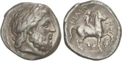 GREEK COINS Ancient Greece Tetradracma. 359-336 a.C. FILIPO II. AMPHIPOLIS. MACEDONIA. Anv.: Cabeza de Zeus laureado a derecha. Rev.: Jinete marchando a derecha, debajo símbolo y monograma. 14,03 grs.