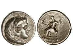 Tetradracma. 336-323 a.C. ALEJANDRO MAGNO. Anv.: Cabeza de Hércules con piel de león a derecha. Rev.: Zeus entronizado a izquierda, detrás leyenda, delante símbolo. 17,10 grs. AR. Se-6718 var. MBC.