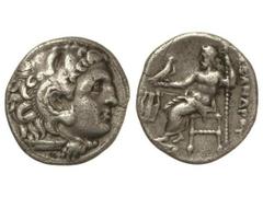 Dracma. 336-323 a.C. ALEJANDRO MAGNO. MACEDONIA. Anv.: Cabeza de Hércules con piel de león a derecha. Rev.: Zeus entronizado a izquierda, alrededor leyenda y símbolos. 3,90 grs. AR. (Pequeñas rayitas 