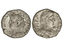 Tetradracma. 54-68 d.C. NERÓN y POPEA. Anv.: Cabeza radiada de Nerón a izquierda, alrededor leyenda. Rev.: Busto velado de Popea a derecha, alrededor leyenda. 12,40 grs. Ve. MBC.