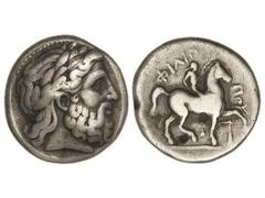 Tetradracma. 359-336 a.C. FILIPO II. MACEDONIA. Anv.: Cabeza laureada de Zeus a derecha. Rev.: Jinete a caballo a derecha sosteniendo palma, alrededor leyenda. 14 grs. AR. Se-6680. MBC/MBC-.