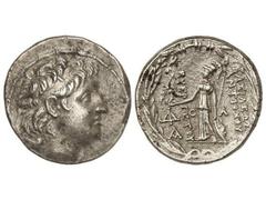 Tetradracma. 138-129 a.C. ANTÍOCOS VII. REINO SELÉUCIDA. Anv.: Cabeza diademada a derecha. Rev.: Atenea en pie a izquierda con escudo y lanza, sosteniendo a Nike. 16,52 grs. AR. (Acuñación algo descen