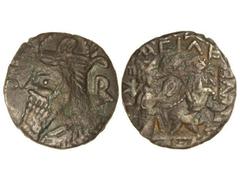 Tetradracma. 208-222 d.C. VOLOGASES VI. PARTIA. Anv.: Busto barbado y diademado a izquierda. Rev.: El rey entronizado a izquierda recibiendo diadema de Tyche. 9,15 grs. Ve. Pátina verde. (Pequeñas oxi