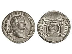 Denario. Acuñada el 80 d.C. TITO. Anv.: IMP. TITVS CAES. VESPASIAN. AVG. P.M. Cabeza laureada a izquierda. Rev.: TR. P. IX. IMP. XV. COS. VIII. P. P. Rayo sobre mesa. 3,60 grs. C-314. (EBC-).