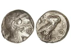 Tetradracma. 449-413 a.C. ATTICA. ATENAS. Anv.: Busto con casco de Atenas a derecha. Rev.: Lechuza en pie a derecha, delante A¶E, detrás rama de olivo y creciente. 17,06 grs. Contramarca en anverso. S