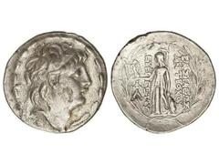 Tetradracma. 138-129 a.C. ANTÍOCO VII. REINO SELÉUCIDA. Anv.: Cabeza diademada a derecha. Rev.: Atenea de pie a izquierda, sosteniendo a Nike delante y detrás leyenda, todo dentro de corona de laurel.