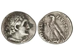 Tetradracma. 285-246 a.C. PTOLOMEO II. EGIPTO. Anv.: Cabeza diademada a derecha. Rev.: Águila a izquierda, alrededor leyenda. 13,77 grs. AR. (Pequeños golpecitos). Se-7774 var. (MBC+).