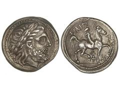 Tetradracma. 356-336 a.C. FILIPO II. ANFÍPOLIS. Anv.: Cabeza de Zeus laureado a derecha. Rev.: Jinete a derecha, debajo antorcha y detrás ¶y HE¶en monograma. 14,27 grs. AR. Bonita pátina. CY-1212 var.