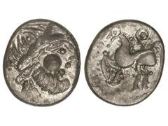 Tetradracma. Siglo II a. C. SYRMIA. CELTAS DEL ESTE. Anv.: Cabeza estilizada de Zeus a derecha. Rev.: Caballo a izquierda. 8,50 grs. Tipo Kugelwange. MBC+.