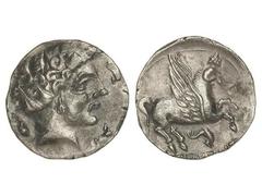 Dracma. DRACMA IBÉRICA DE IMITACIÓN EMPORITANA CON LEYENDAS NO VISIBLES O INDETERMINABLES. Anv.: Cabeza femenina a derecha rodeada por tres delfines. Rev.: Pegaso a derecha con la cabeza modificada, d