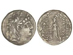 Tetradracma. 138-129 a.C. ANTÍOCO VII. REINO SELÉUCIDA. Anv.: Cabeza diademada a derecha. Rev.: Atenea en pie a izquierda sosteniendo a Nike, delante y detrás leyenda. 15,56 grs. AR. Se-7092. MBC/MBC+